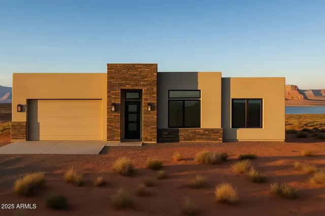 a front view of a house with a garage