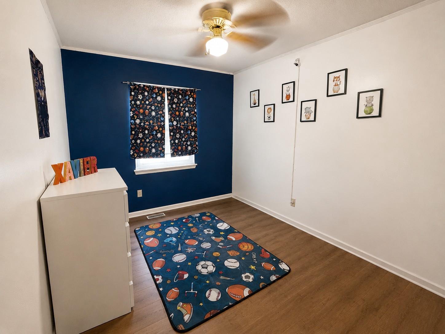 813 Thimbleberry Road, Unit 813 Baltimore, MD 21220 - Photo 20 of 32 Bedroom 3: Cosmic-themed children's retreat.