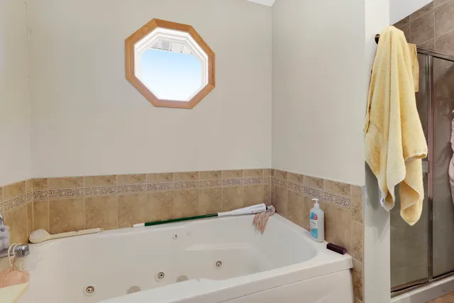 a view of room with furniture and windows