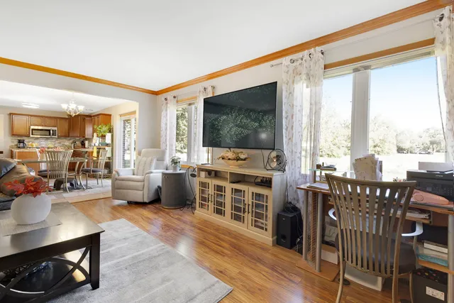 a view of a livingroom with furniture window and outside view