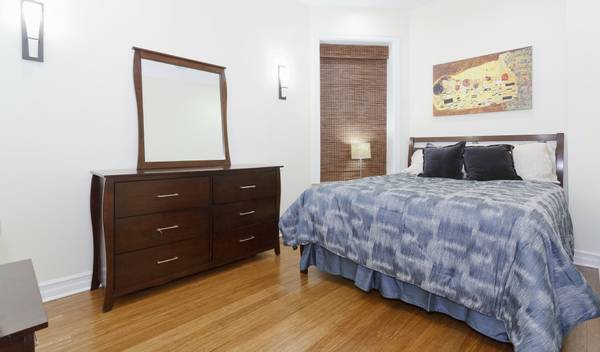 3529 North Reta Avenue, Unit 3R Chicago, IL 60657 - Photo 11 of 14 a bedroom with a bed and a dresser