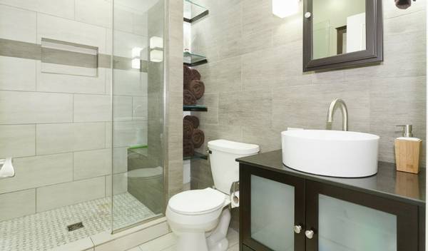 3529 North Reta Avenue, Unit 3R Chicago, IL 60657 - Photo 12 of 14 a bathroom with a sink toilet and shower