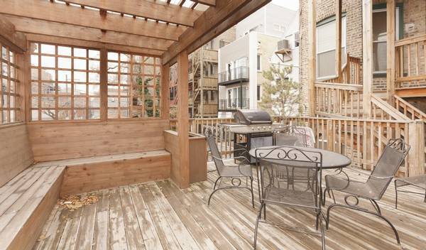 3529 North Reta Avenue, Unit 3R Chicago, IL 60657 - Photo 14 of 14 a bath room with a table and chairs