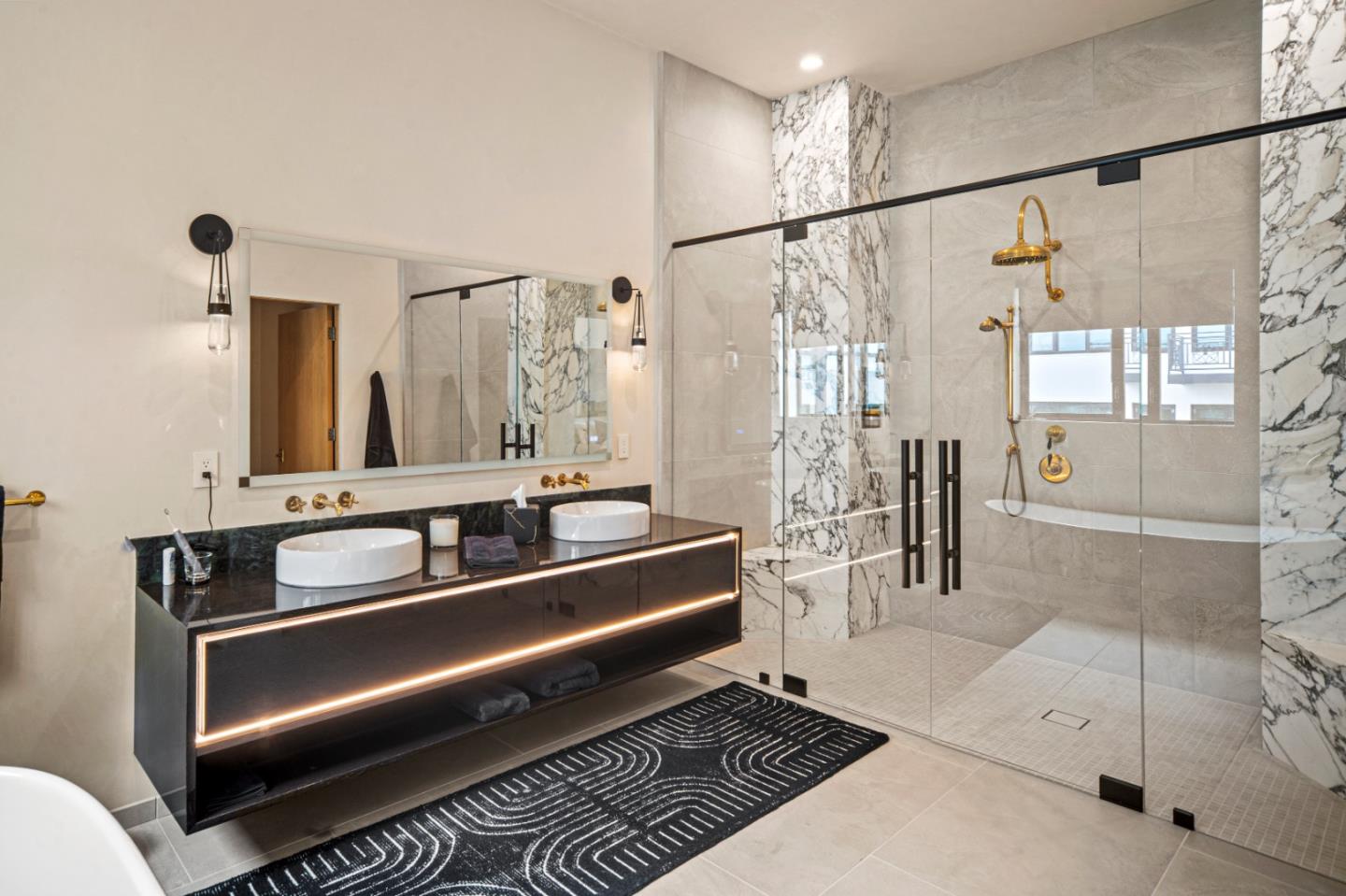 520 Lighthouse Avenue, Unit 301 Pacific Grove, CA 93950 - Photo 13 of 23 a bathroom with a tub a sink and a shower