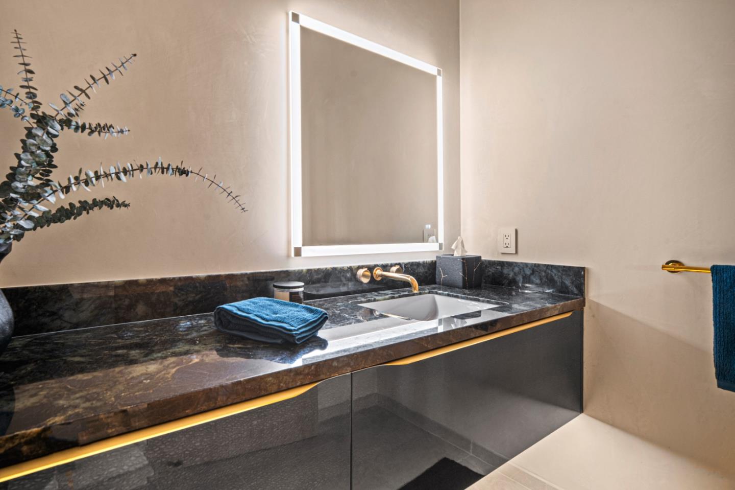 520 Lighthouse Avenue, Unit 301 Pacific Grove, CA 93950 - Photo 20 of 23 a bathroom with a sink and a mirror