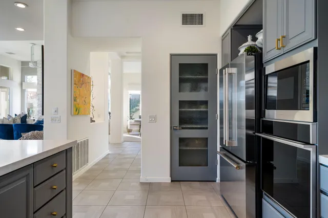 a view of a table and chairs in the patio