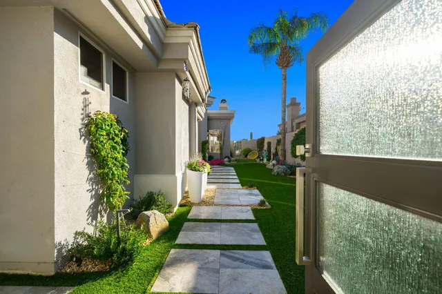 a stove top oven sitting inside of a kitchen
