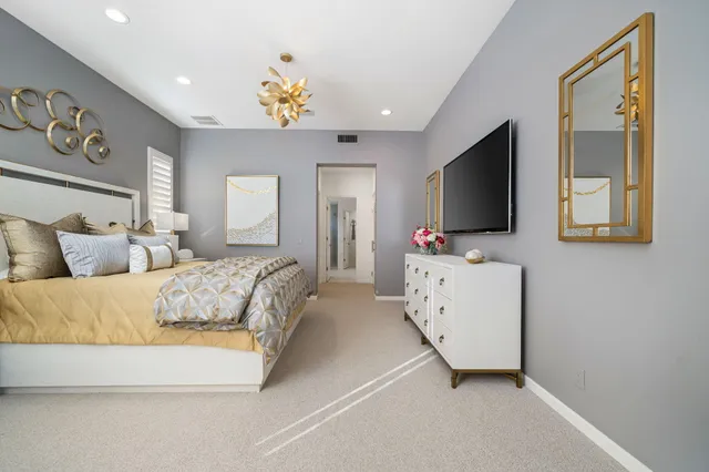 a view of a swimming pool with a lounge chair