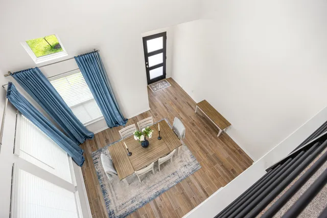 a view of living room with furniture and a window