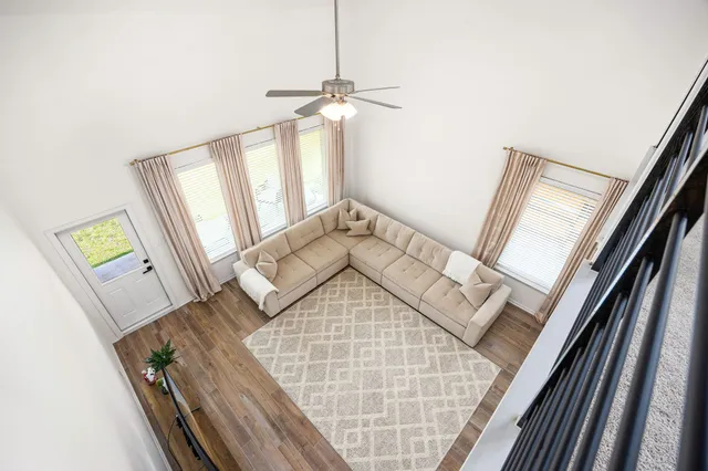 a view of an entryway with wooden floor
