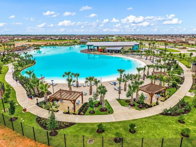 an aerial view of residential building and lake view