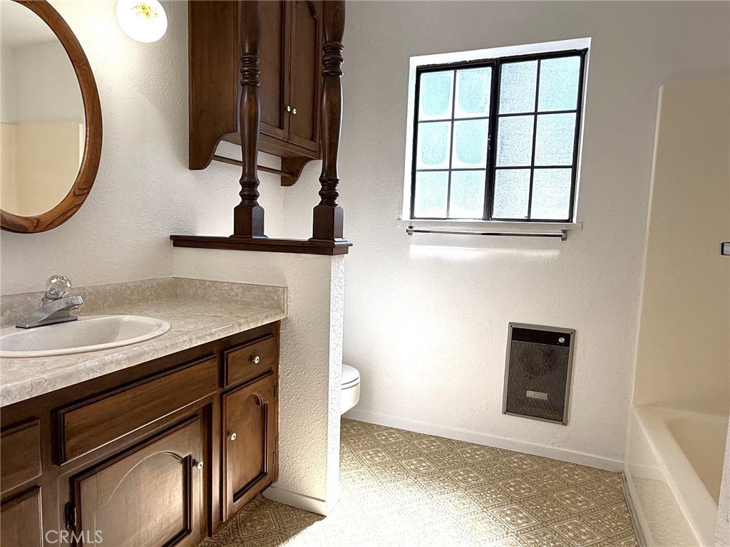 5636 East Whitlock Road Mariposa, CA 95338 - Photo 24 of 41 a bathroom with a sink and a mirror