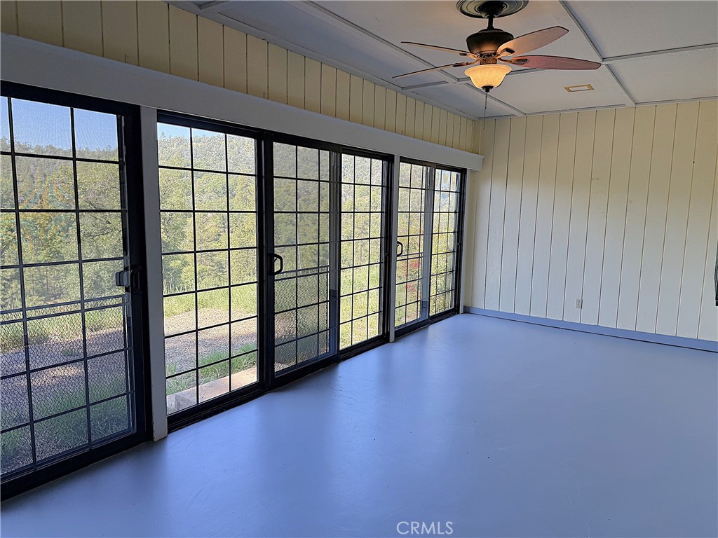 5636 East Whitlock Road Mariposa, CA 95338 - Photo 32 of 41 an empty room with windows