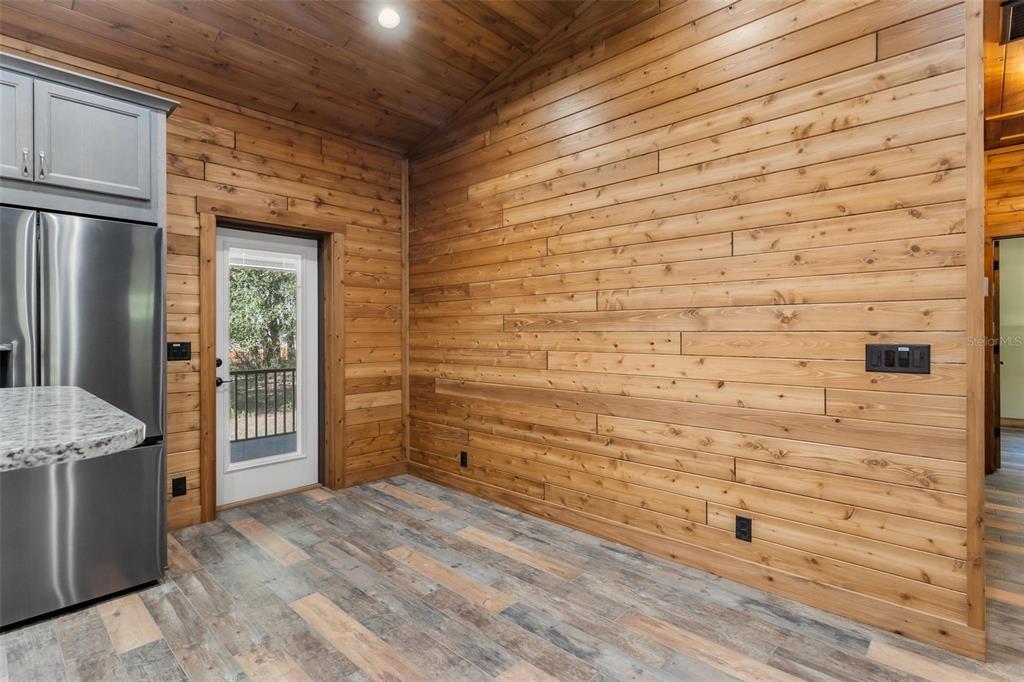 37590 Rolling Acres Road Lady Lake, FL 32159 - Photo 13 of 30 a view of empty room with wooden floor