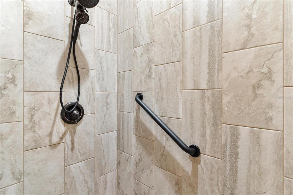 37590 Rolling Acres Road Lady Lake, FL 32159 - Photo 18 of 30 a bathroom with a shower