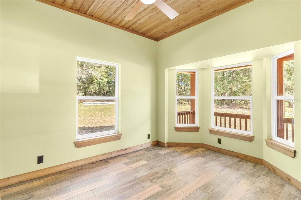 37590 Rolling Acres Road Lady Lake, FL 32159 - Photo 19 of 30 a view of an empty room with a window