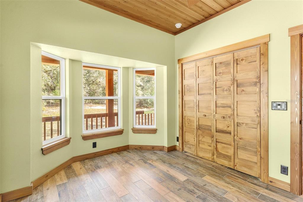 37590 Rolling Acres Road Lady Lake, FL 32159 - Photo 20 of 30 a view of an empty room with a window