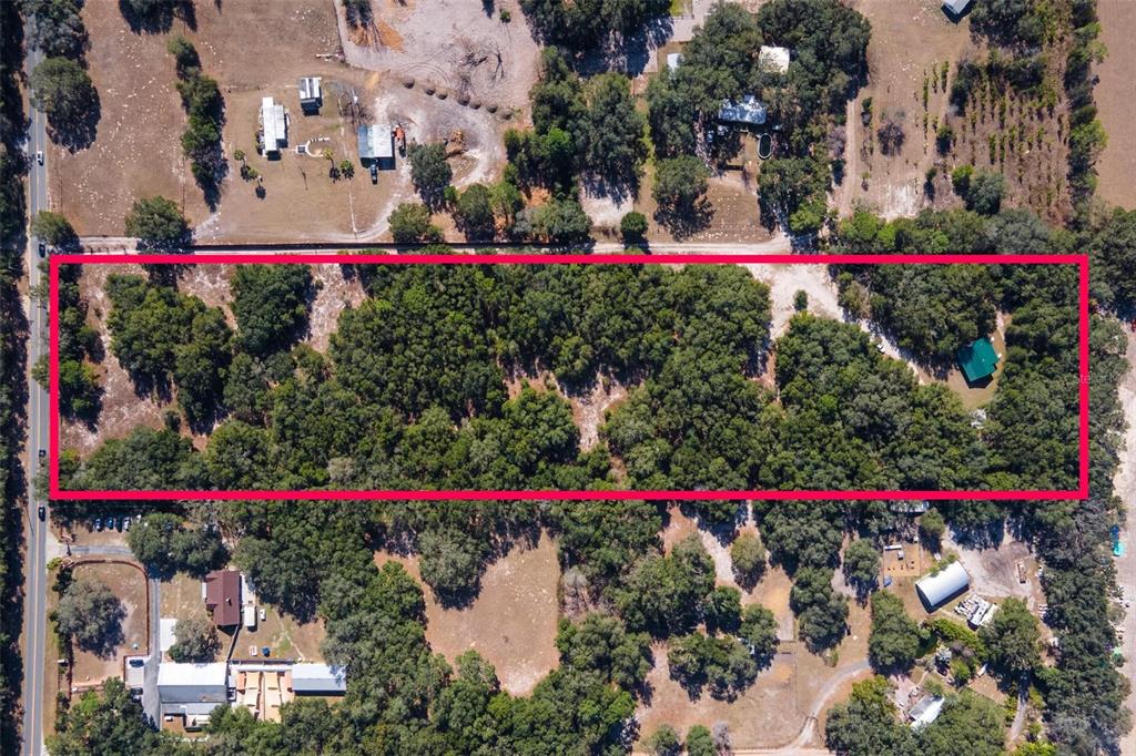 37590 Rolling Acres Road Lady Lake, FL 32159 - Photo 30 of 30 a view of city and flowers around