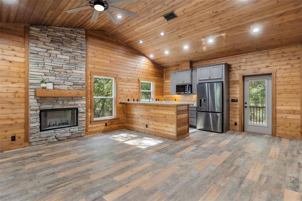 37590 Rolling Acres Road Lady Lake, FL 32159 - Photo 5 of 30 a view of a livingroom with a fireplace