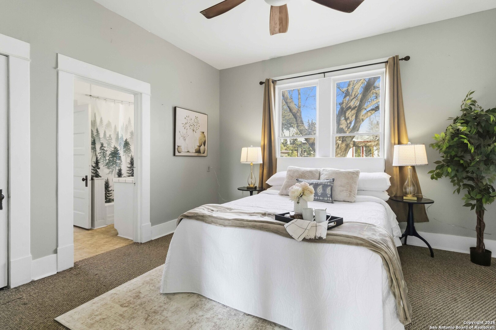 1409 21st Street Hondo, TX 78861 - Photo 17 of 25 a bedroom with a bed and wooden floor