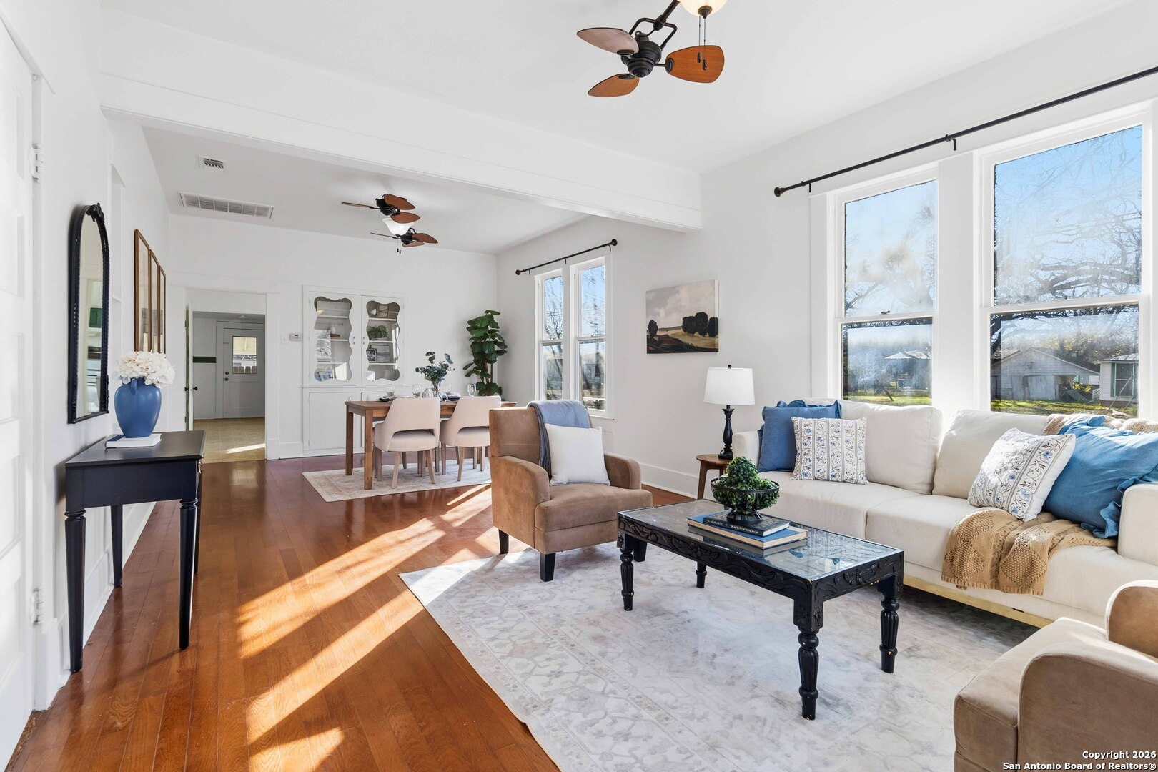 1409 21st Street Hondo, TX 78861 - Photo 8 of 25 a living room with furniture and a table