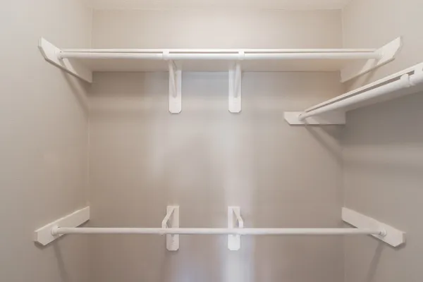 a view of a room with racks on the wall