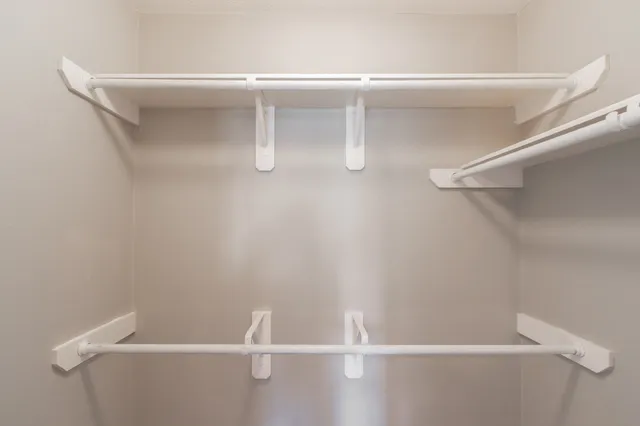 a view of a room with racks on the wall