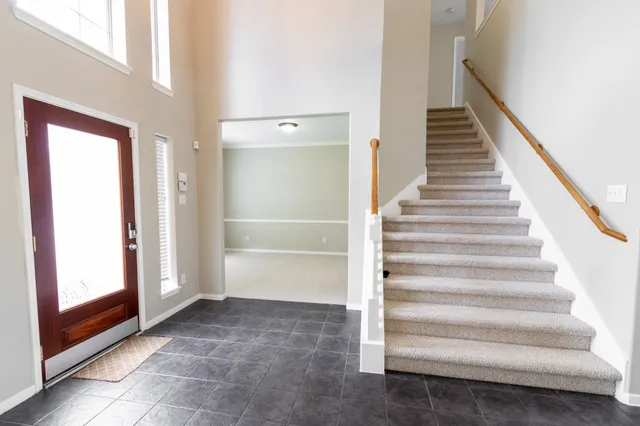 a view of an entryway with staircase