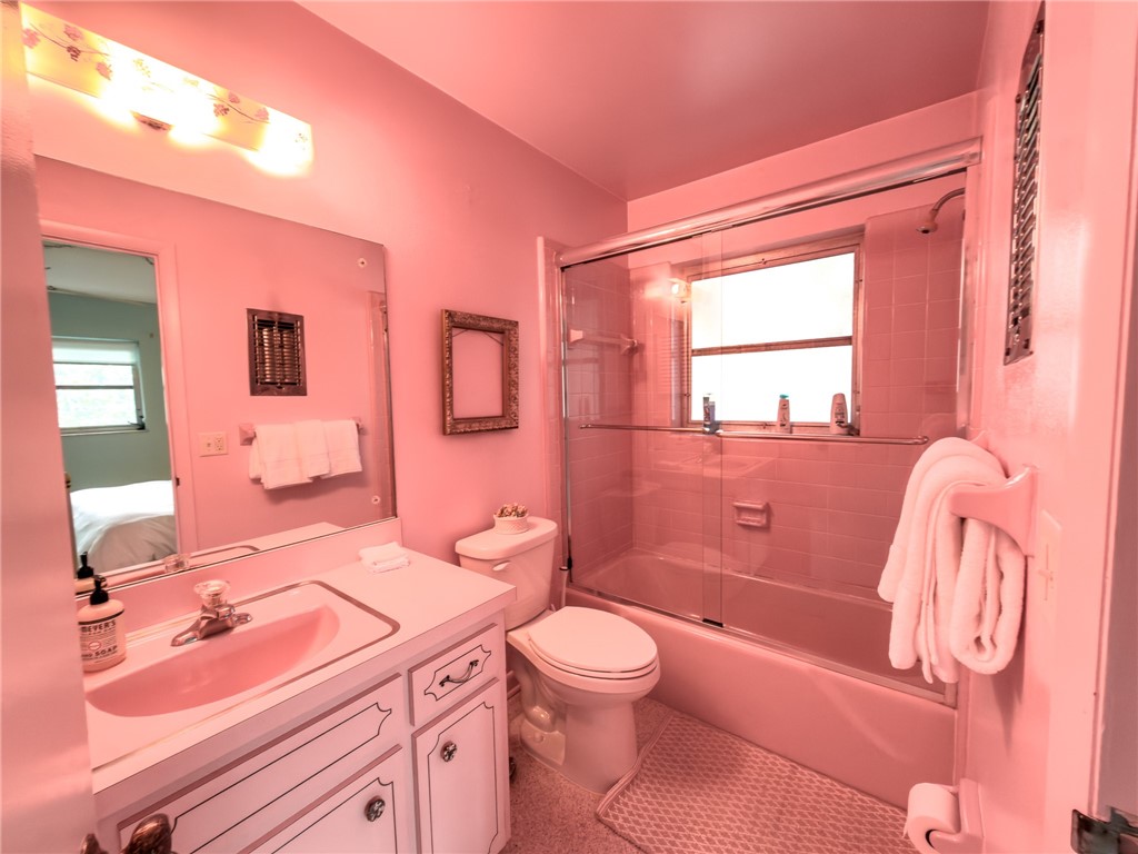 846 Date Palm Road Vero Beach, FL 32963 - Photo 27 of 29 a bathroom with a sink a toilet and shower