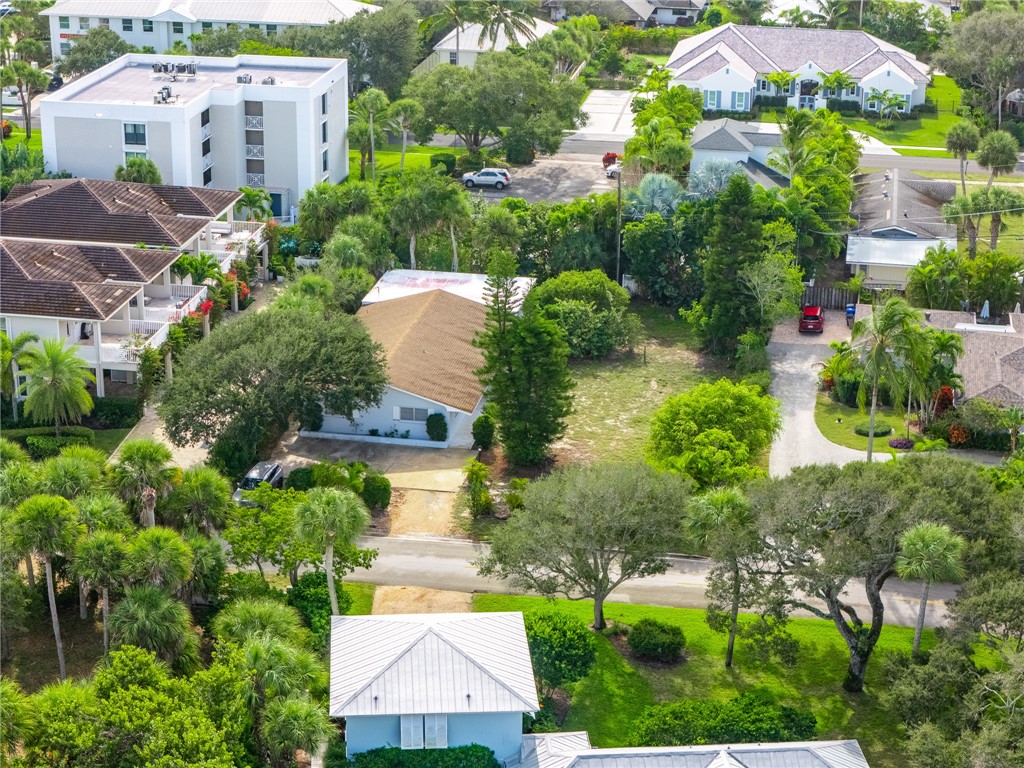 846 Date Palm Road Vero Beach, FL 32963 - Photo 4 of 29 an aerial view of multiple houses with yard