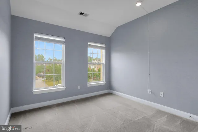 a view of an empty room with window