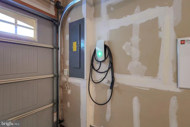 a balcony with wooden floor and fence