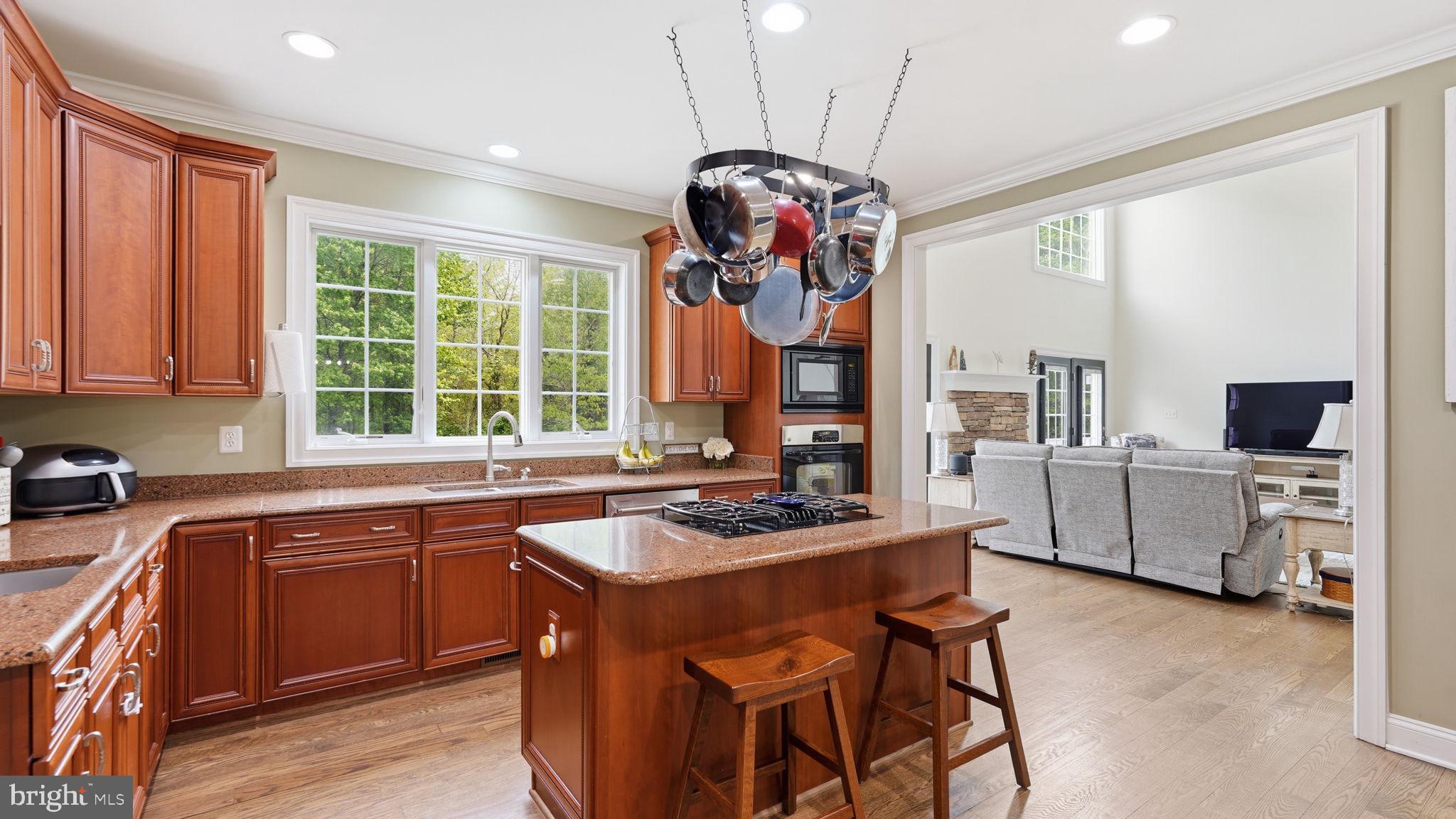 15613 Thoroughfare Road Gainesville, VA 20155 - Photo 13 of 64 Inviting kitchen with modern charm.