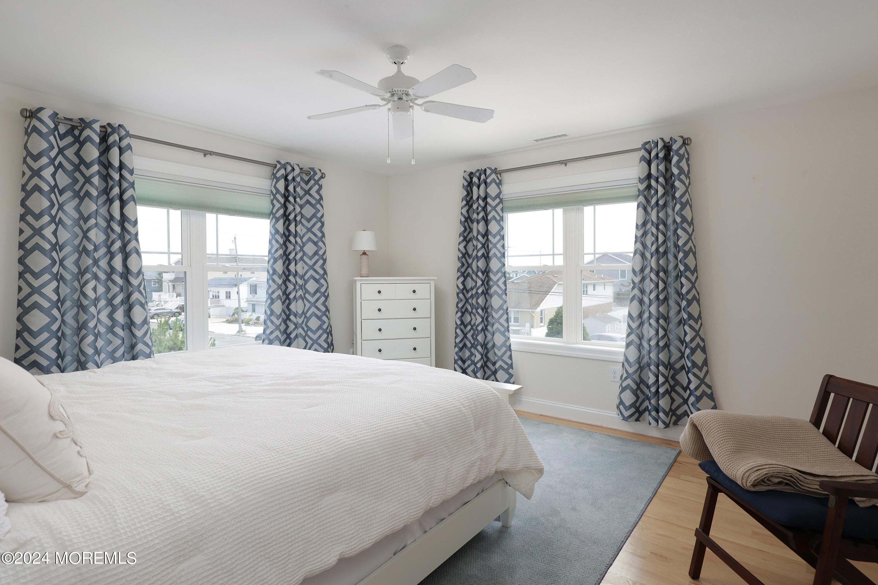 1607 Baltimore Avenue Lavallette, NJ 08735 - Photo 14 of 28 a bedroom with a bed and a window