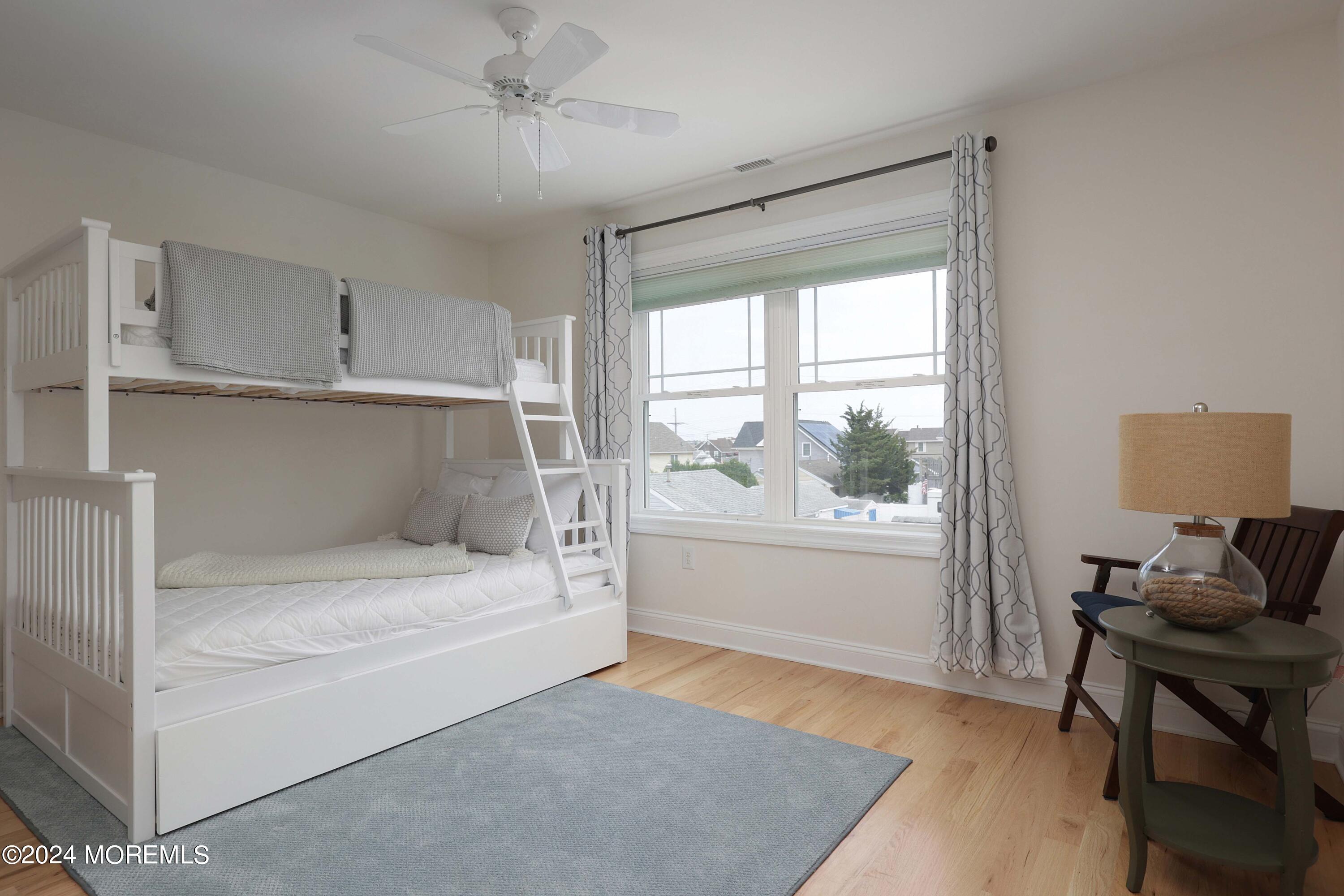 1607 Baltimore Avenue Lavallette, NJ 08735 - Photo 17 of 28 a living room with furniture and a window