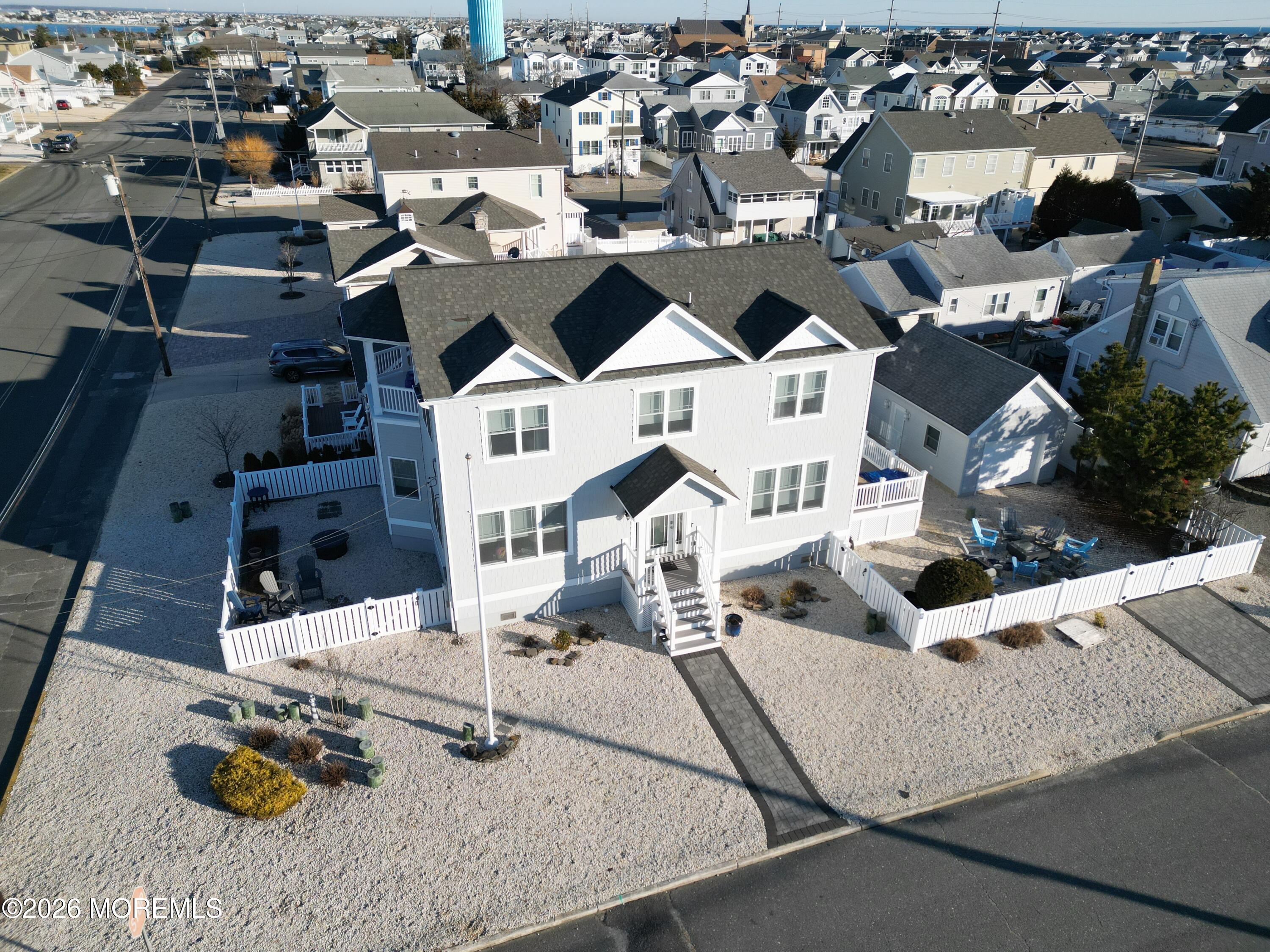 1607 Baltimore Avenue Lavallette, NJ 08735 - Photo 2 of 28 an aerial view of a house with parking space