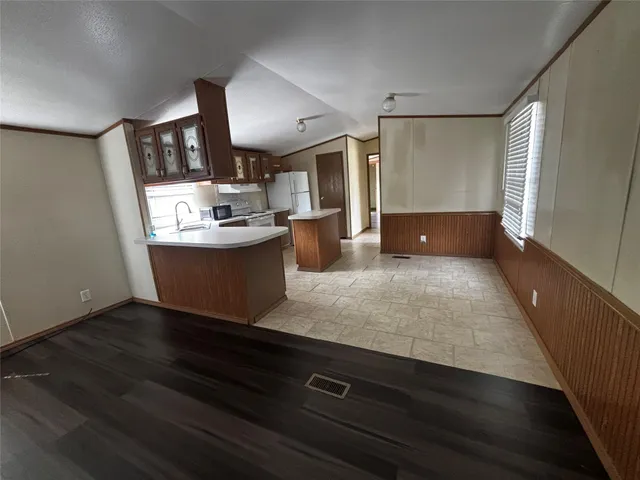 a view living room with furniture and wooden floor