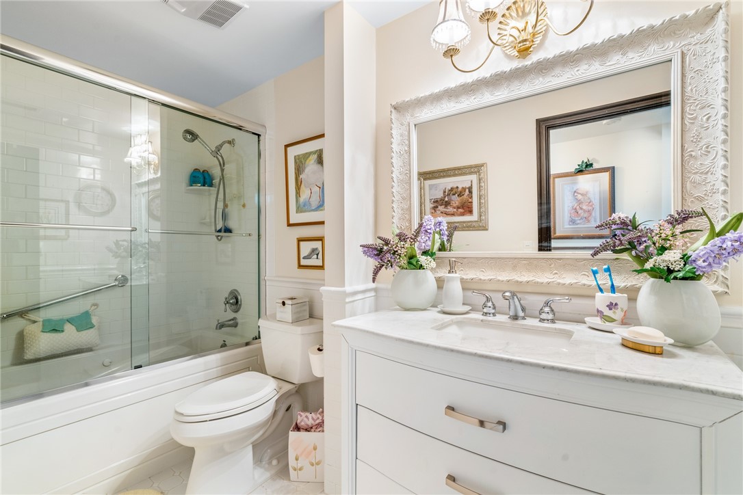 650 Beach Road, Unit 245 Vero Beach, FL 32963 - Photo 15 of 32 a bathroom with a sink a toilet and shower