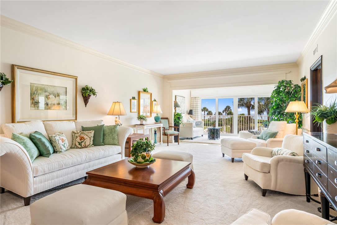 650 Beach Road, Unit 245 Vero Beach, FL 32963 - Photo 2 of 32 a living room with furniture and a large window