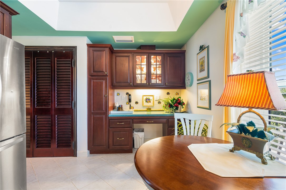 650 Beach Road, Unit 245 Vero Beach, FL 32963 - Photo 24 of 32 a view of a dining room with furniture and window