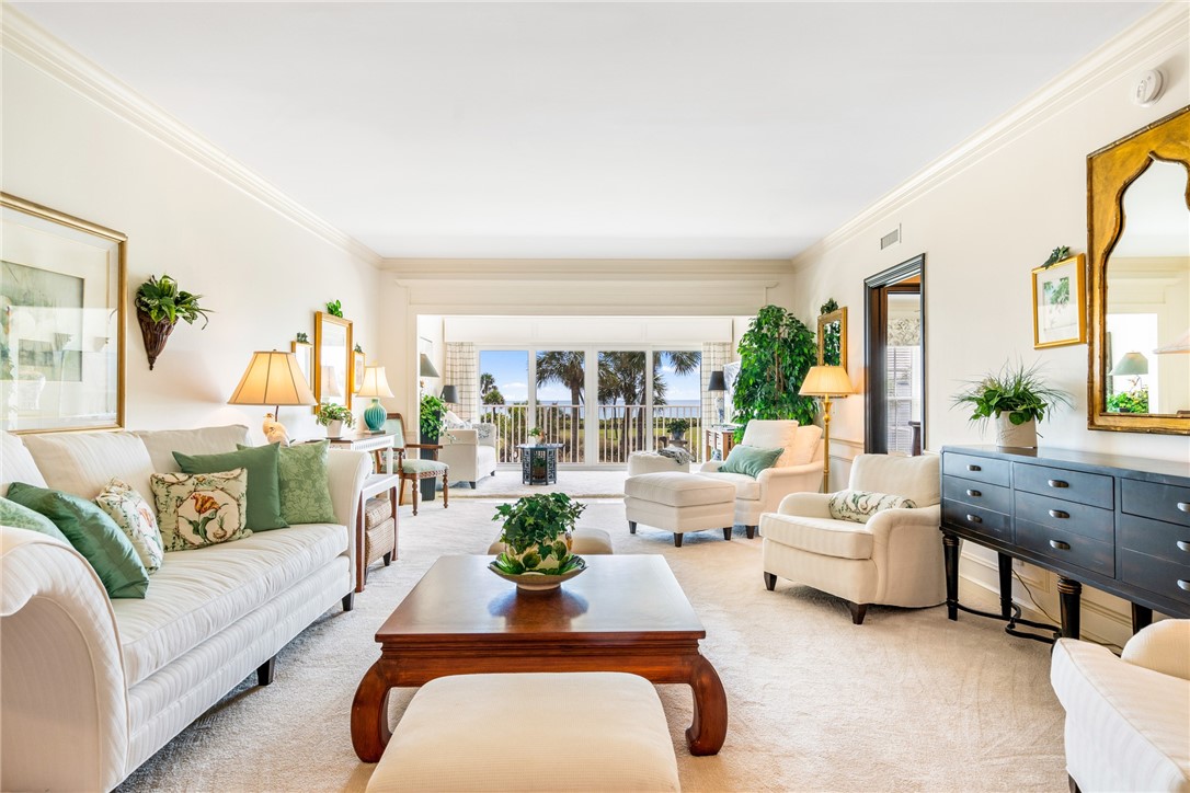 650 Beach Road, Unit 245 Vero Beach, FL 32963 - Photo 3 of 32 a living room with furniture and a large window