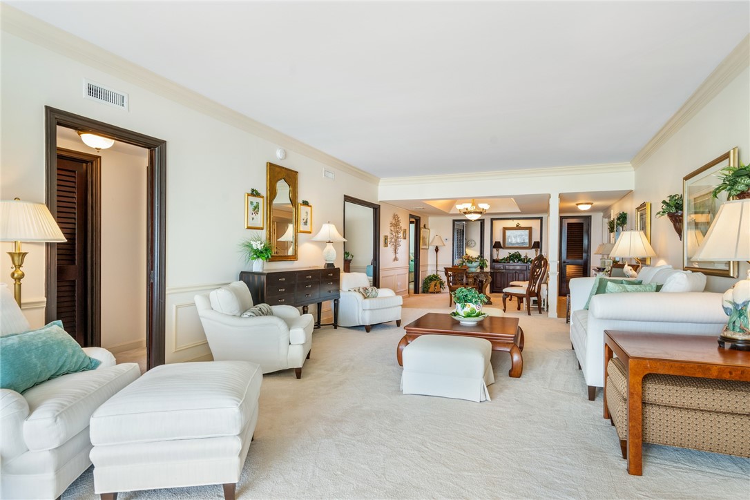 650 Beach Road, Unit 245 Vero Beach, FL 32963 - Photo 9 of 32 a living room with furniture and a table