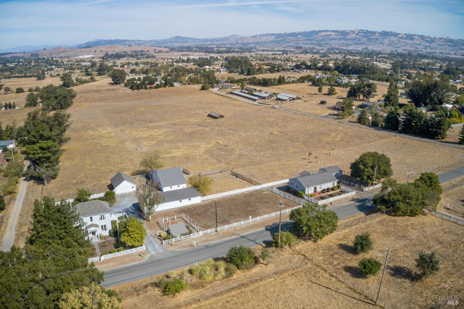 1900-1901 Middle 2 Rock Road Petaluma, CA 94952 - Photo 1 of 1 an aerial view of a house with a ocean view