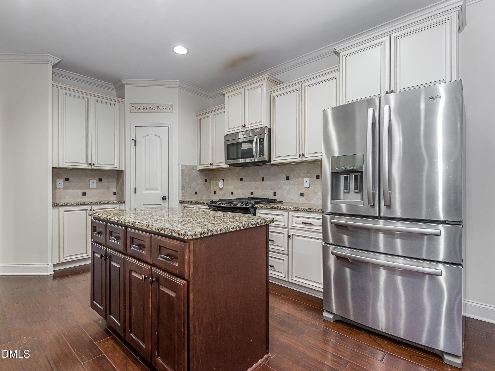 337 Shadowdale Lane Rolesville, NC 27571 - Photo 6 of 42 a kitchen with stainless steel appliances granite countertop a stove a refrigerator and a refrigerator
