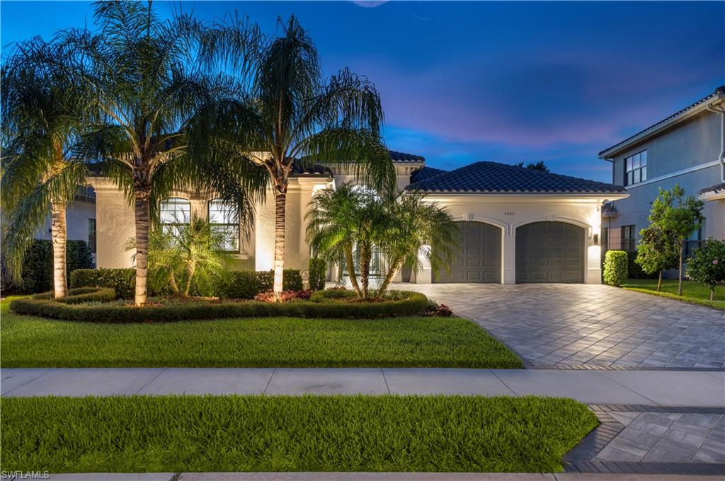 4462 Caldera Circle Naples, FL 34119 - Photo 1 of 33 a view of a yard in front of house