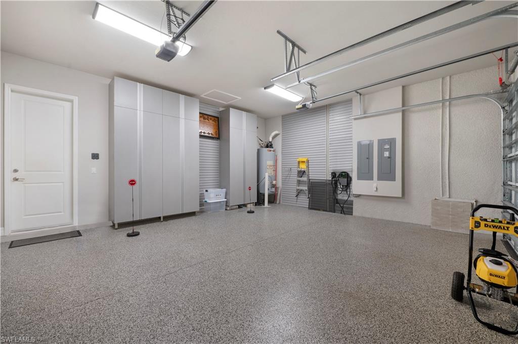 4462 Caldera Circle Naples, FL 34119 - Photo 28 of 33 a view of a livingroom with furniture and a ceiling fan