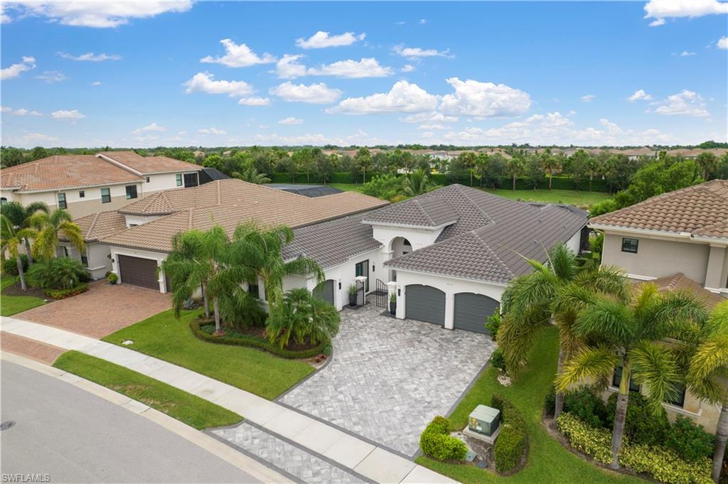4462 Caldera Circle Naples, FL 34119 - Photo 30 of 33 an aerial view of a house