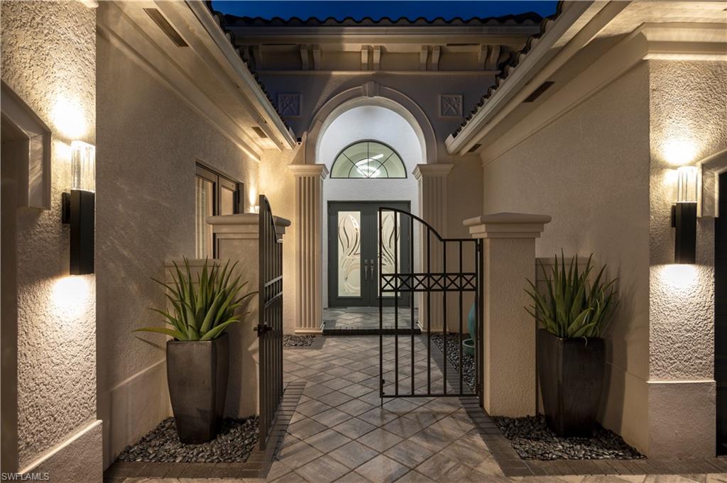 4462 Caldera Circle Naples, FL 34119 - Photo 33 of 33 a view of entryway with wooden floor
