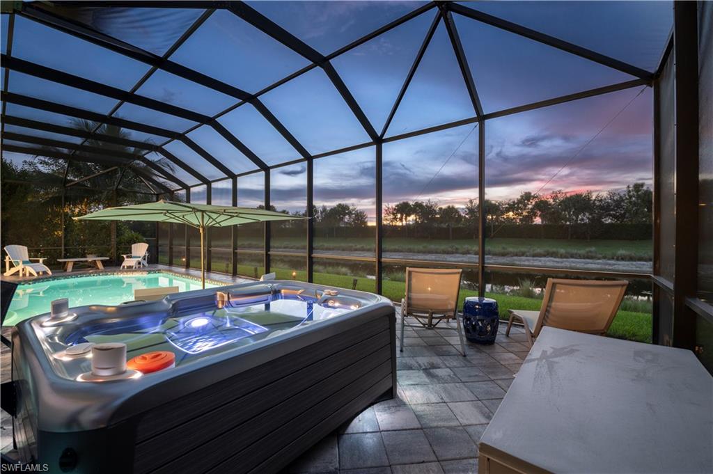 4462 Caldera Circle Naples, FL 34119 - Photo 6 of 33 a outdoor view with a sitting space