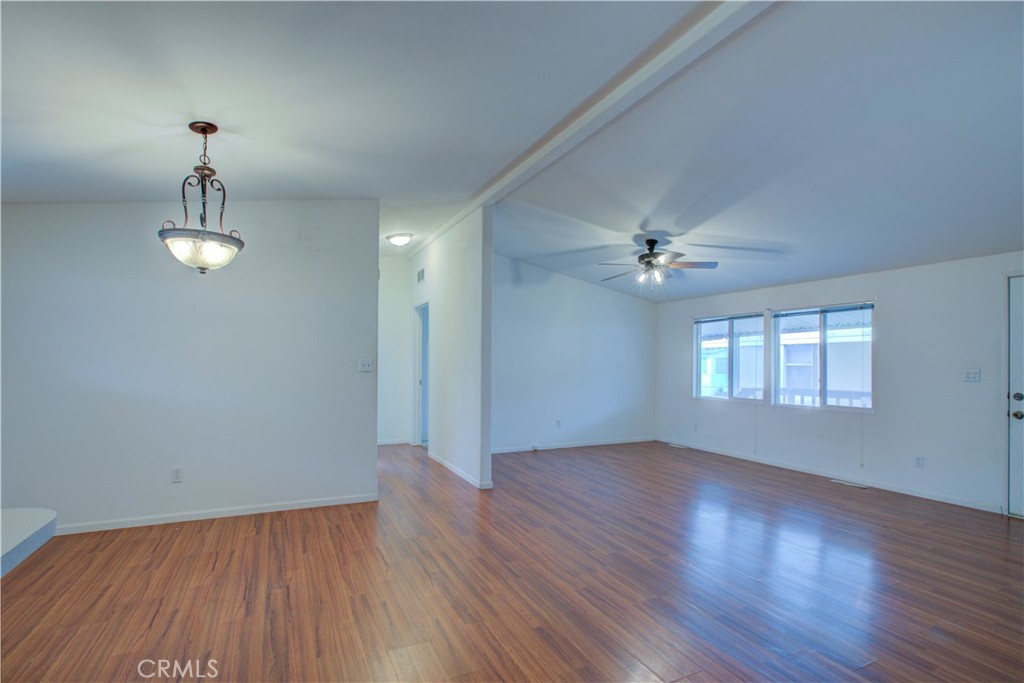 6450 North Winton Way, Unit 93 Winton, CA 95388 - Photo 16 of 51 wooden floor in an empty room with a window